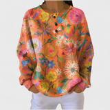 Gerhild™ | Maglione con fiori su corallo