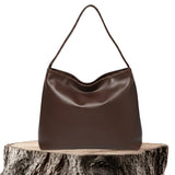 Patricia™ | Borsa a mano in pelle vegana lucida